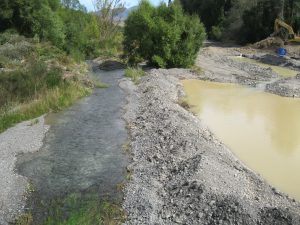 Photograph of diverted water joining braid.